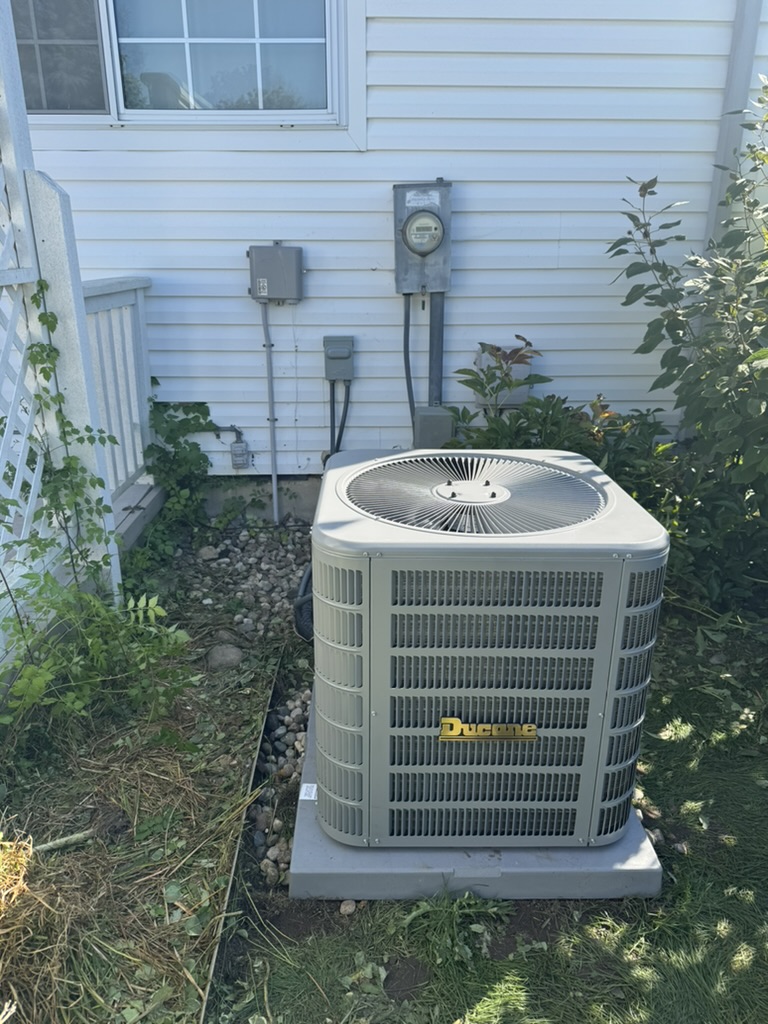 AC repair Washington Township MI outdoor unit serviced by Cooley Mechanical